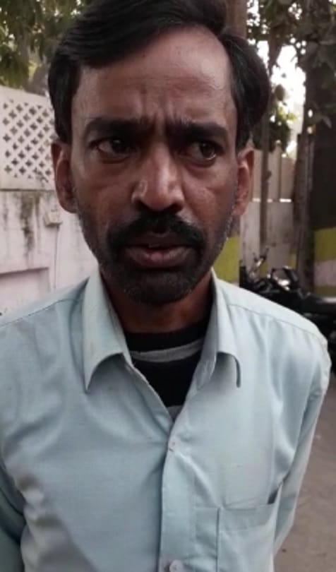 wife talking to someone on phone, annoyed husband cut her hairs
