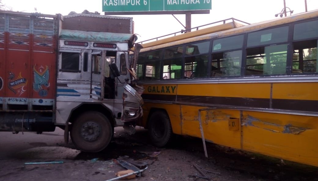Truck collided with a private bus, 12 injured