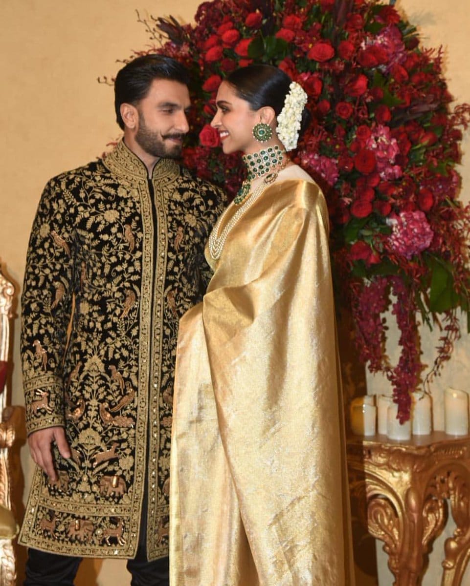 kajal aggarwal isha ambani anushka sharma wearing golden outfit in her wedding reception