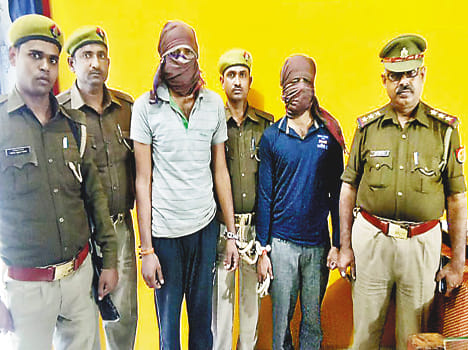 Police firing and scolding criminals