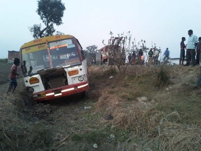 Controlled bus fall into pit