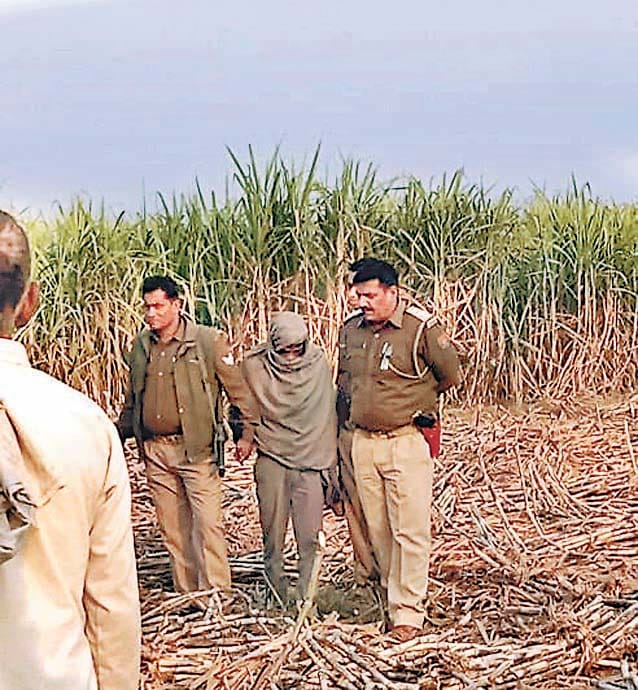 women dead body found in a field.