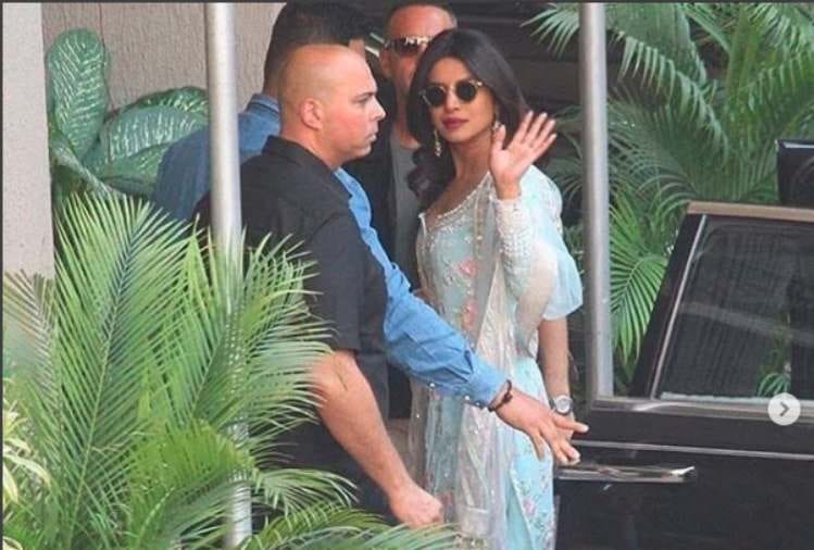 priyanka chopra and nick jonas along with joe jonas and sophie turner in pre wedding puja