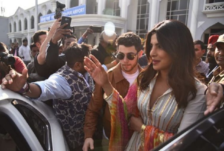 Fans welcome Priyanka Chopra and Nick Jonas outside Jodhpur airport