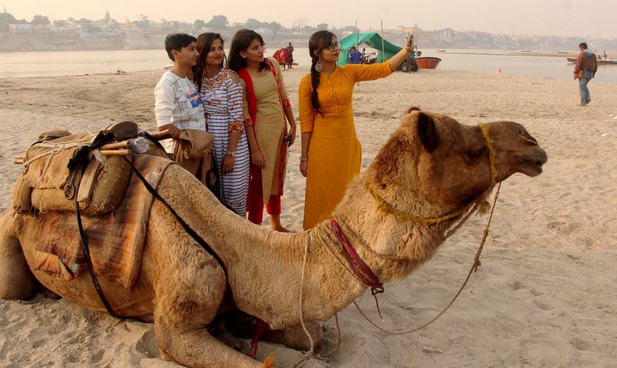 Winter season start varanasi people enjoy on across ganga