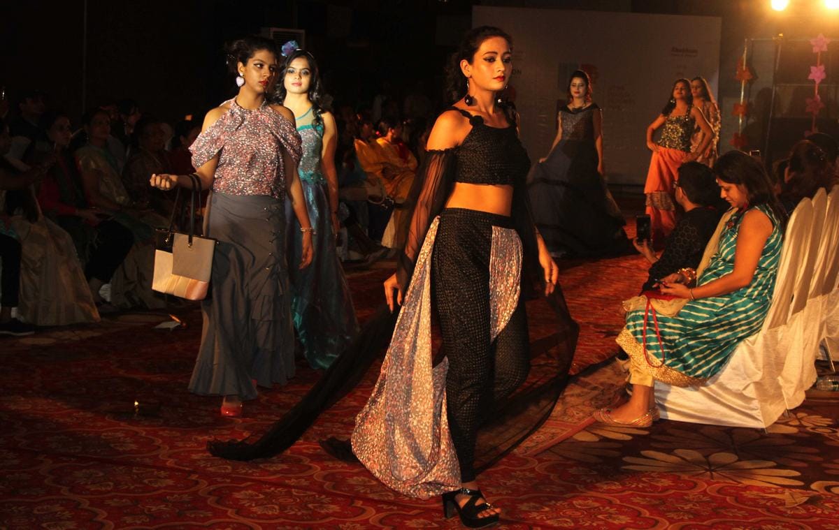 Models walk on ramp in fashion show at varanasi
