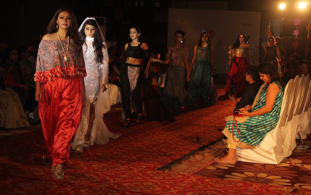 Models walk on ramp in fashion show at varanasi