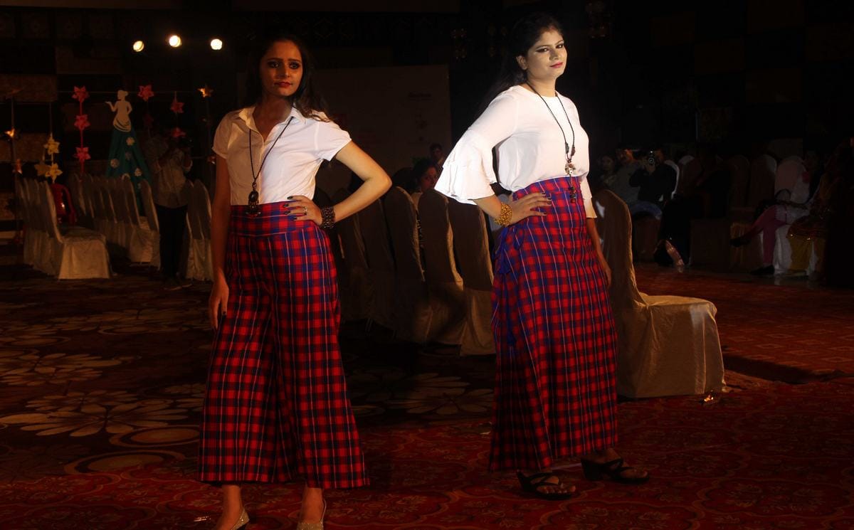 Models walk on ramp in fashion show at varanasi