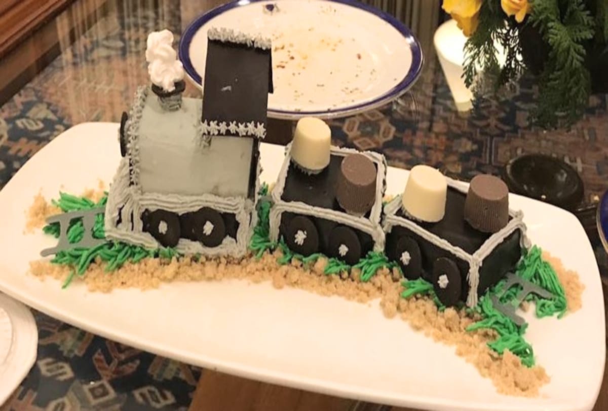 union railway minister piyush goyal cut Rail shaped cake on marriage anniversary