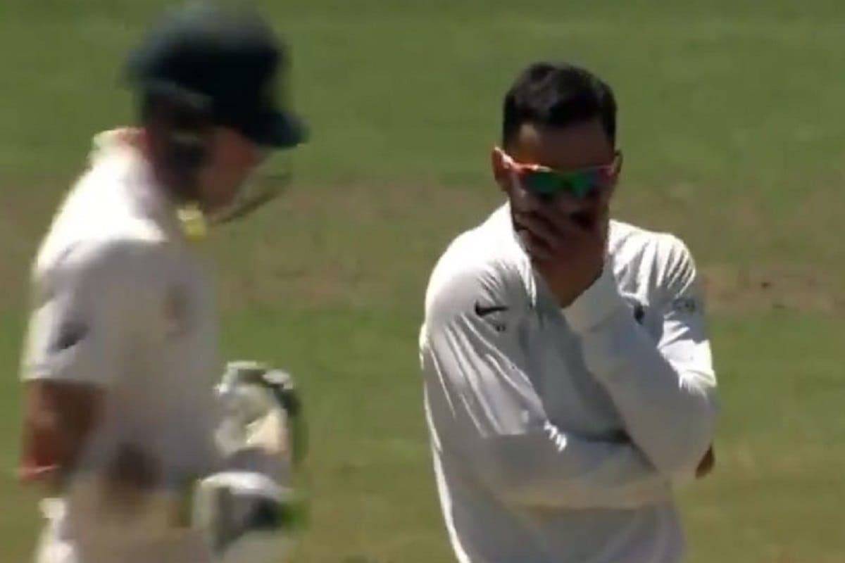 virat kohli laughs after took a wicket of harry nielsen in practice match