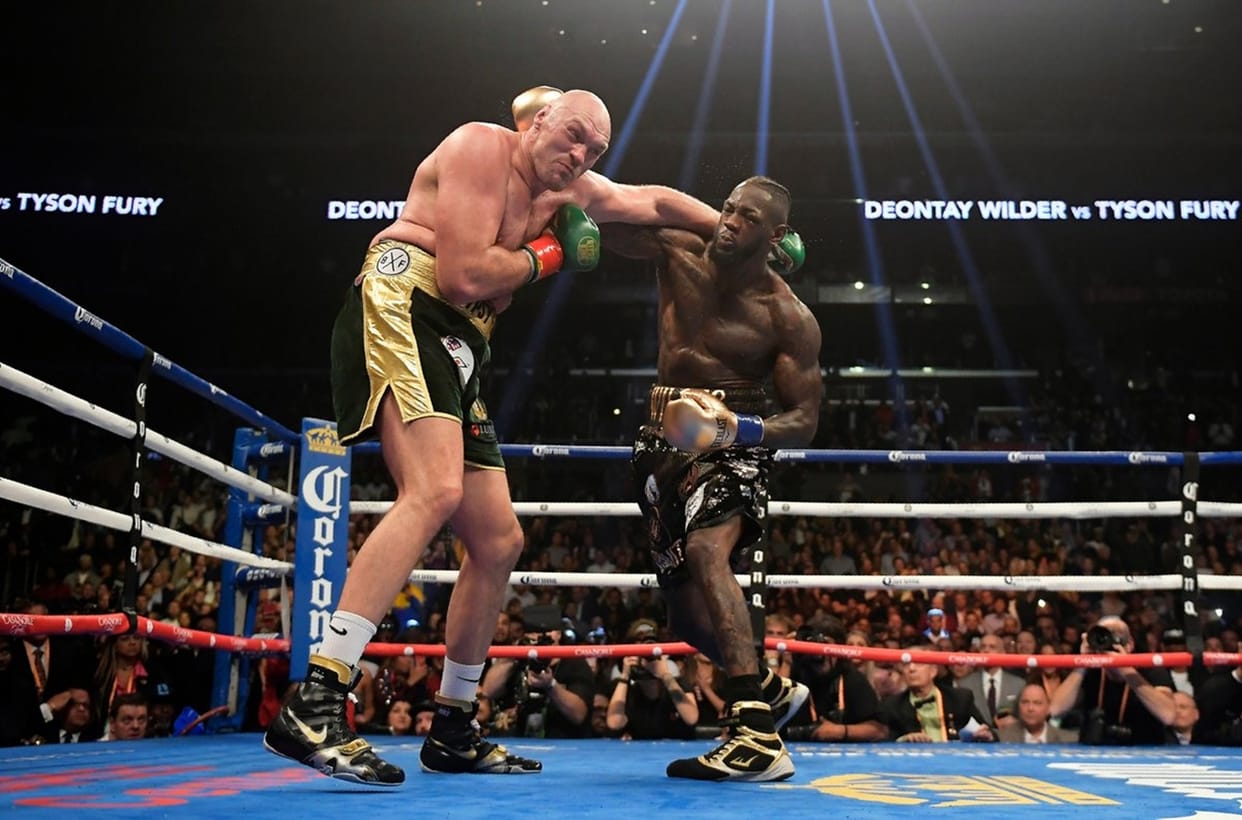 deontay wilder retains heavyweight crown