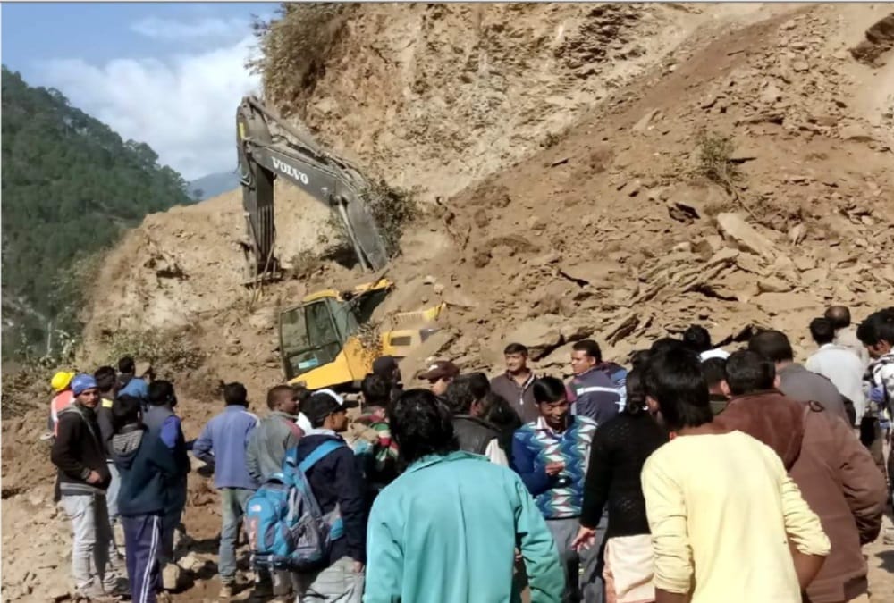 Debris Fall on Jcb during all weather road construction