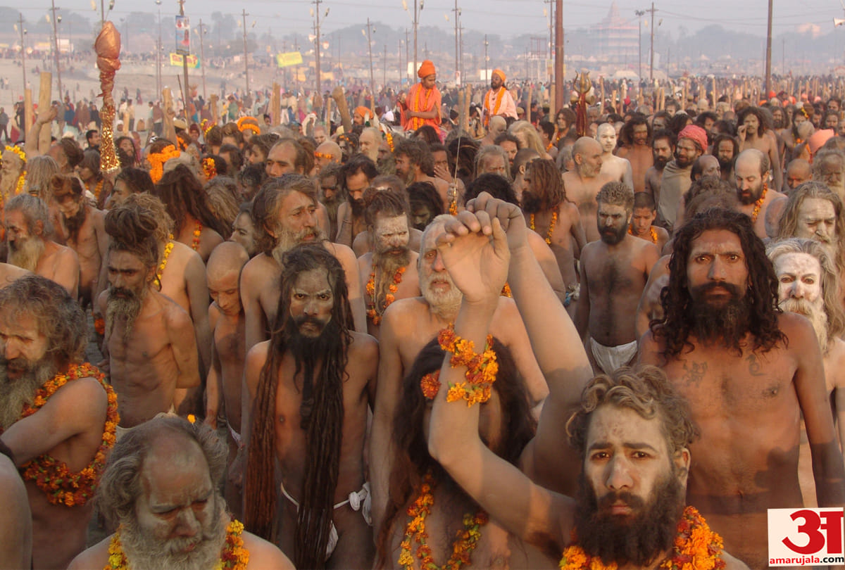 kumbh mela 2019 Devotees take Naga sant foot sand in sangam