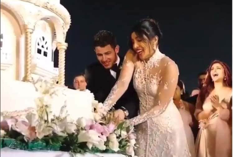 priyanka chopra and nick jonas christian wedding 18 feet long cake cutting video viral