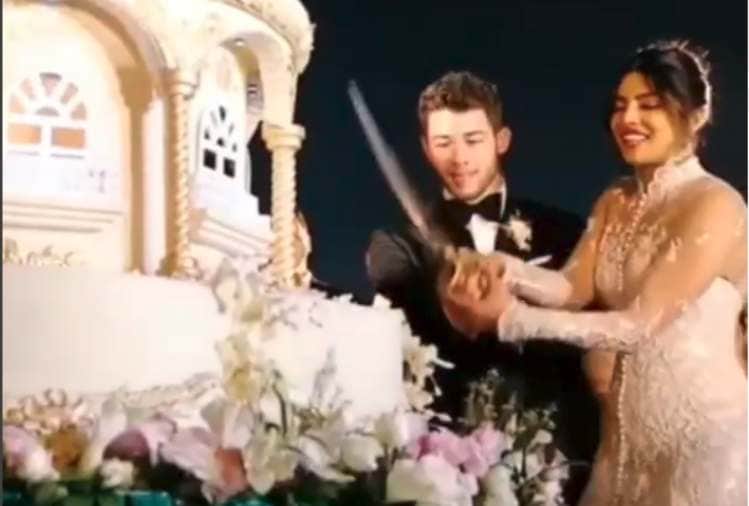 priyanka chopra and nick jonas christian wedding 18 feet long cake cutting video viral