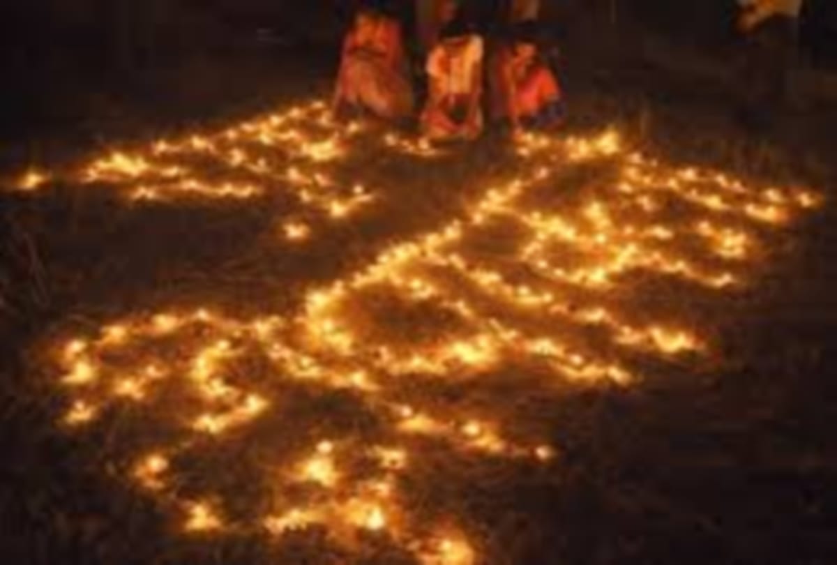 People dance with burning torches in kullu himachal