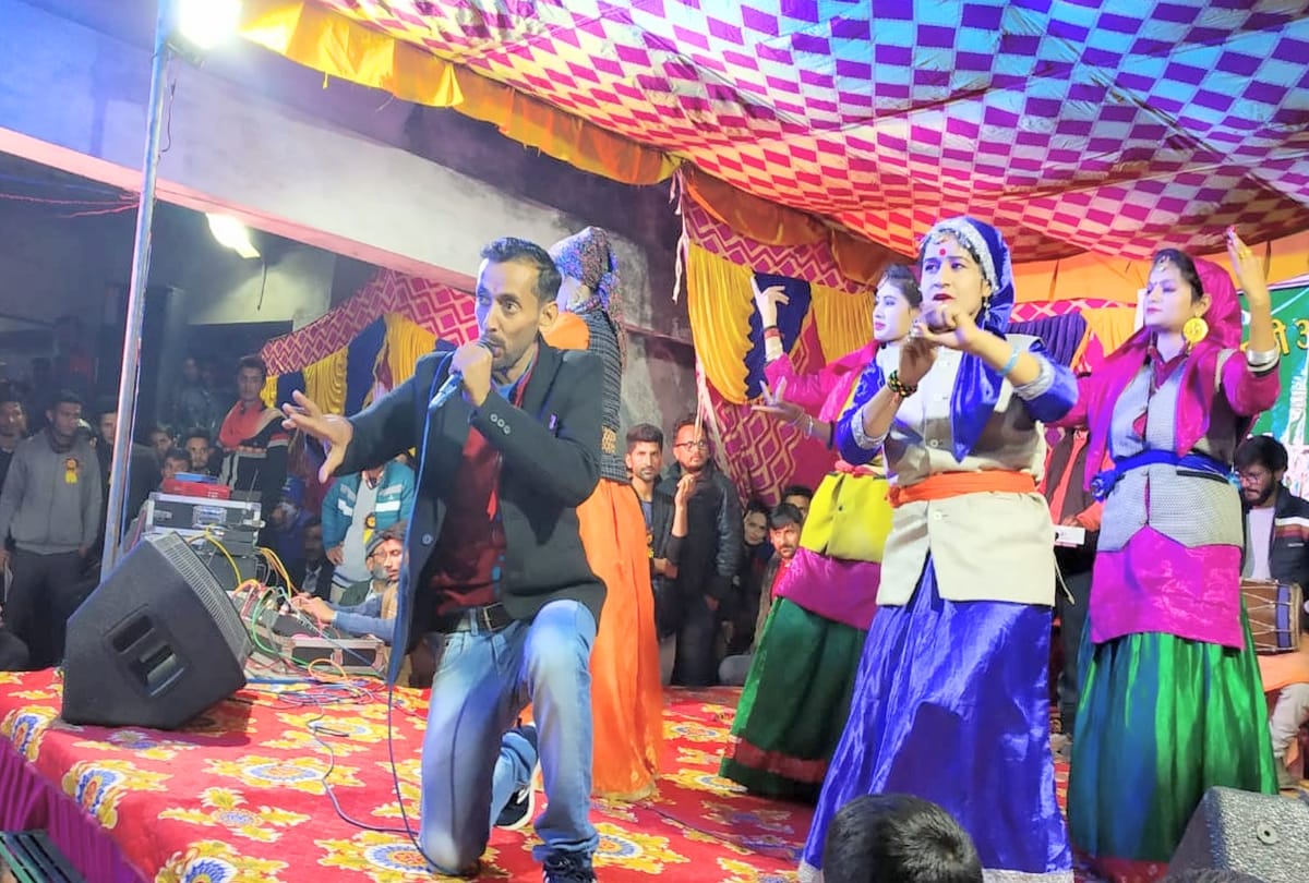 People dance with burning torches in kullu himachal