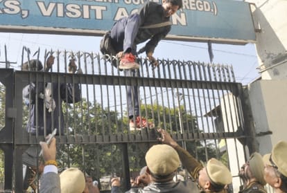 students protest outside the Health Minister's house in Ambala