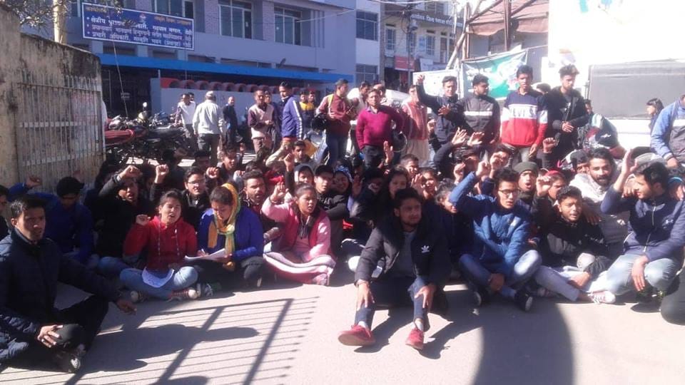 Students climb on roof with petrol during protest against burnt girl negligence