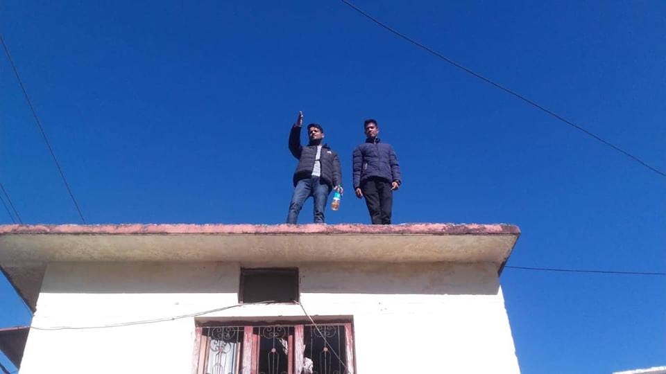 Students climb on roof with petrol during protest against burnt girl negligence