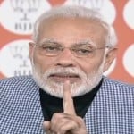कार्यकर्ताओं से संवाद करते प्रधानमंत्री नरेंद्र मोदी