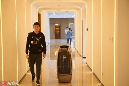 e-commerce giant alibaba group opens future hotel in hangzhou city equipped with AI and robots