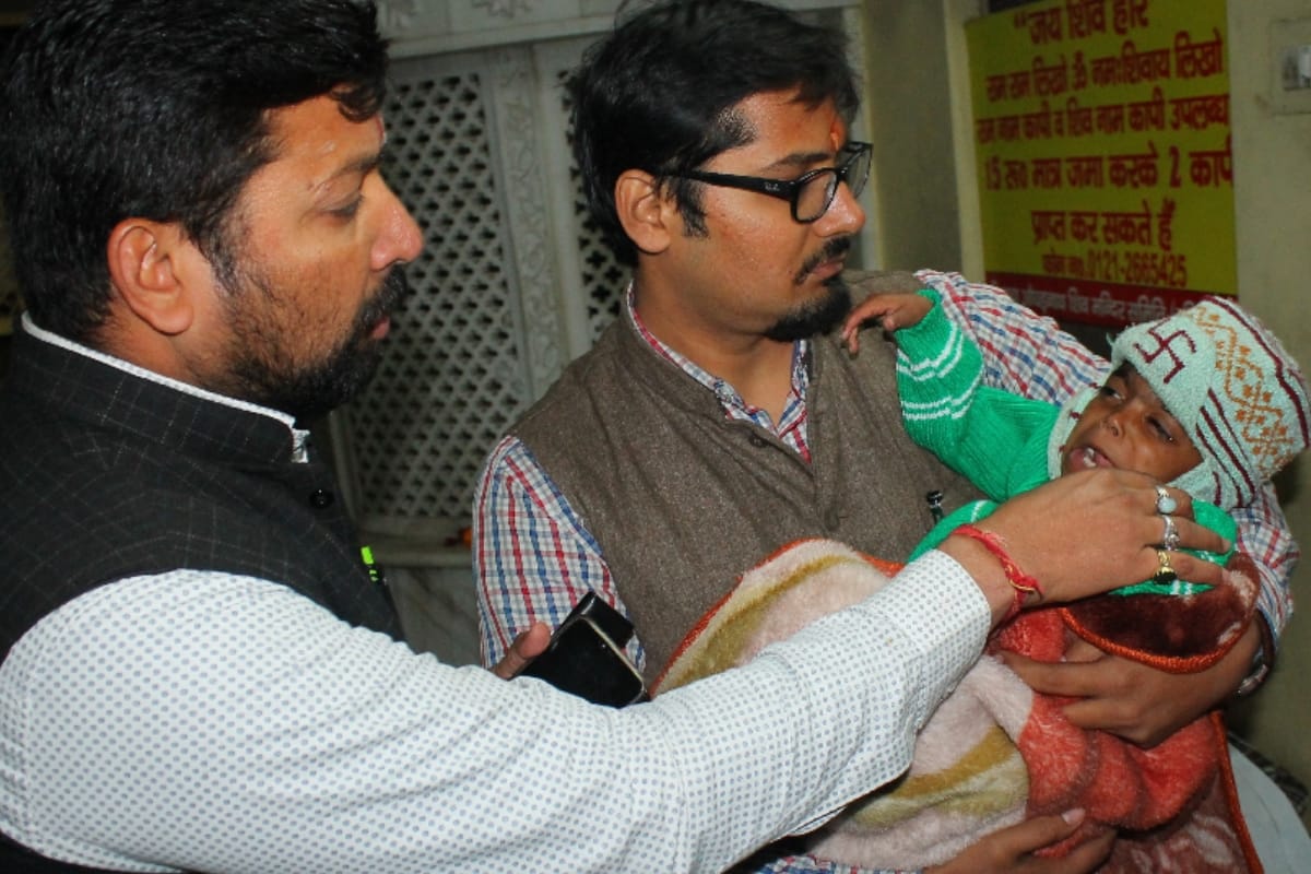 parents left their one year daughter at the temple gate in meerut