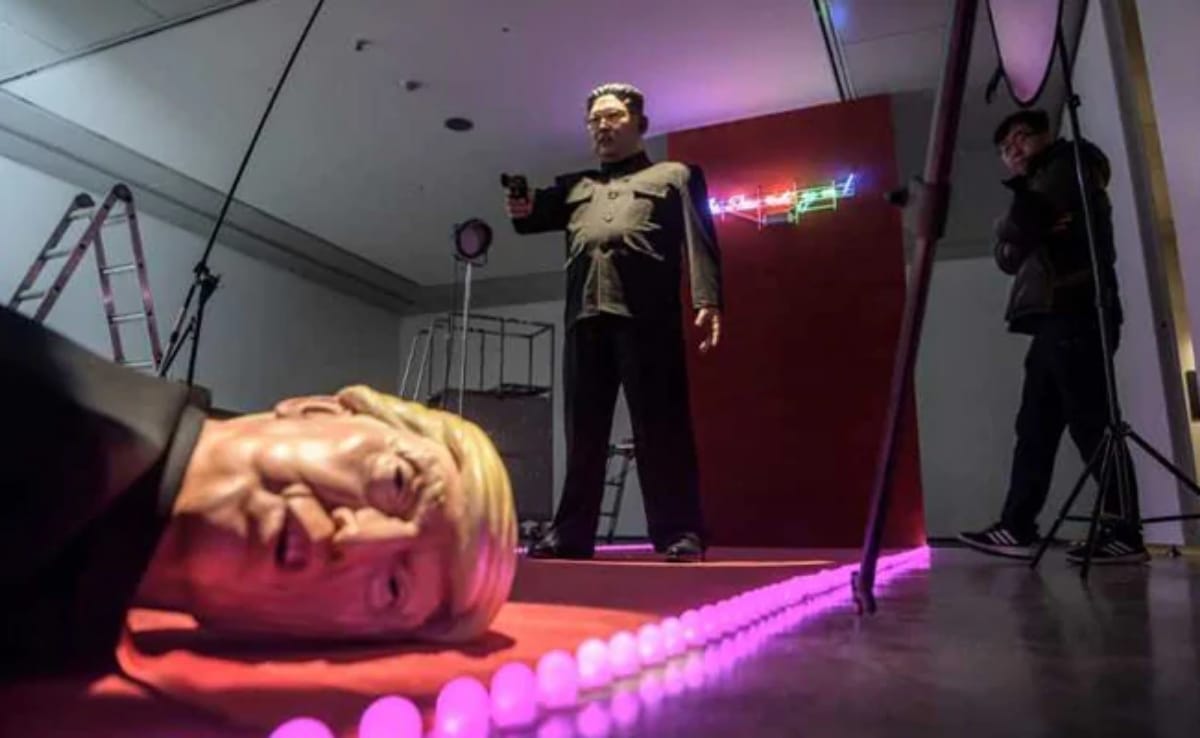 Kim Jong Un shoots Donald Trump, south korean art satire