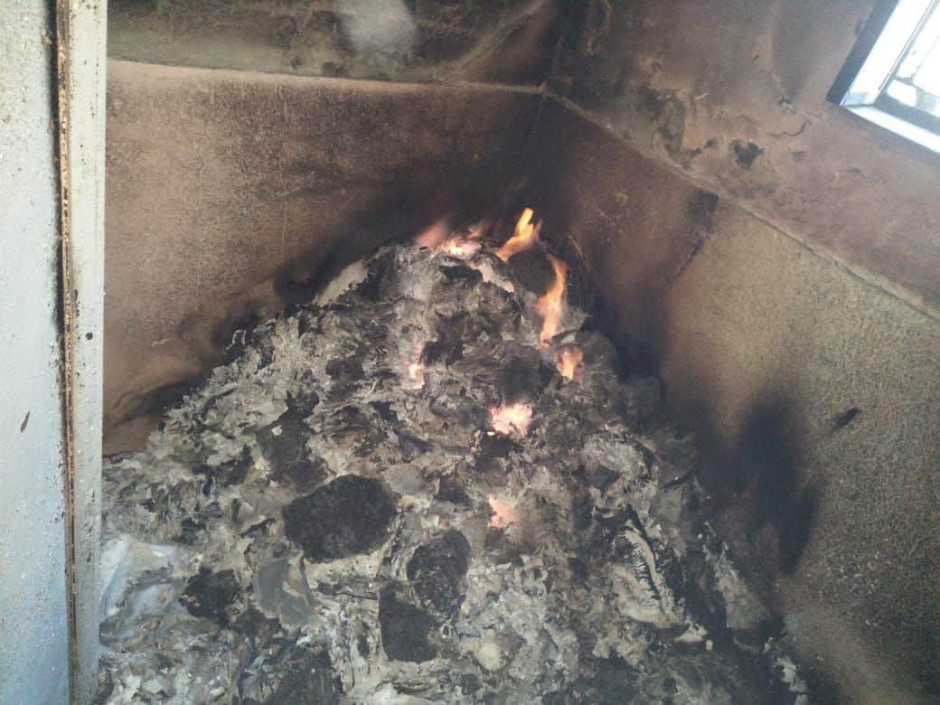 To avoid cold set fire in school library thousands of books