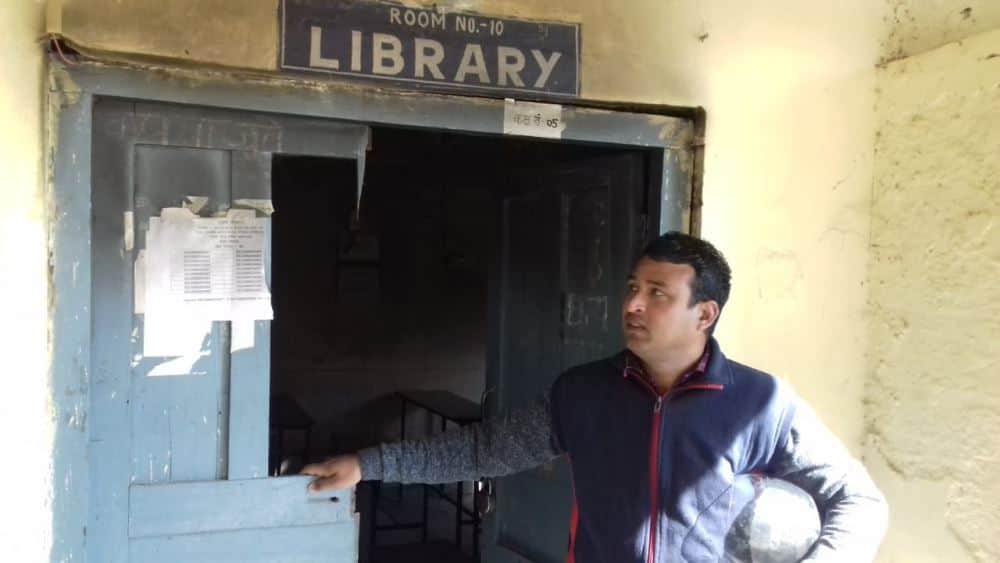 To avoid cold set fire in school library thousands of books