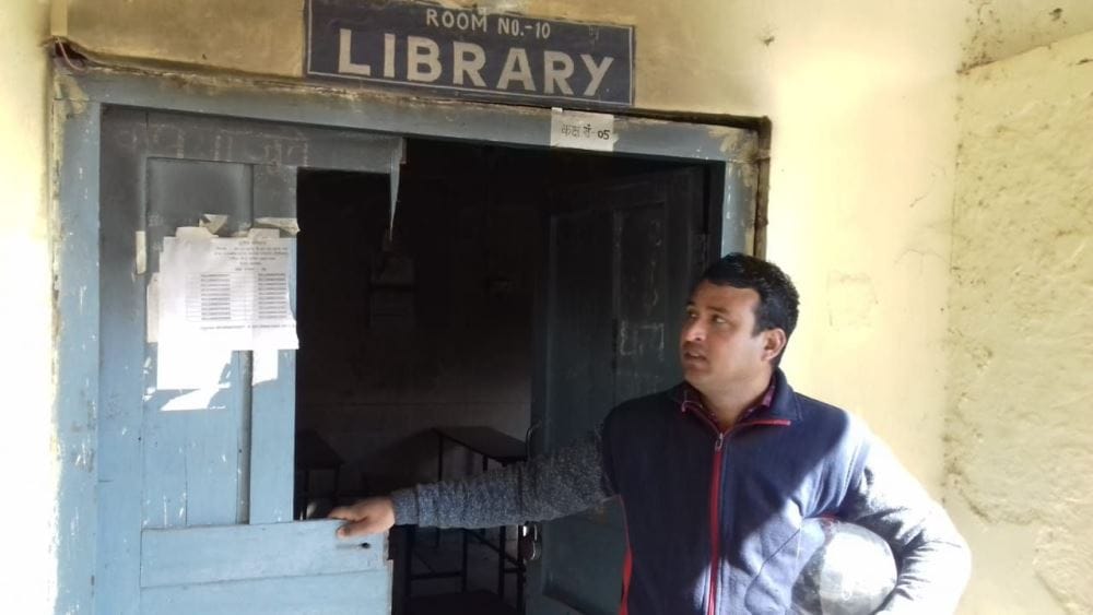 To avoid cold set fire in school library thousands of books