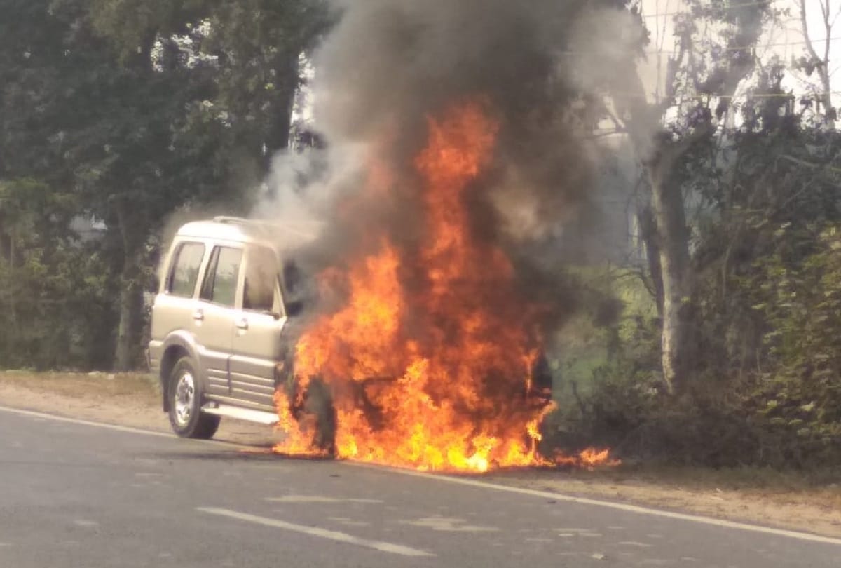 scorpio caught fire on nh, narrow escape for driver