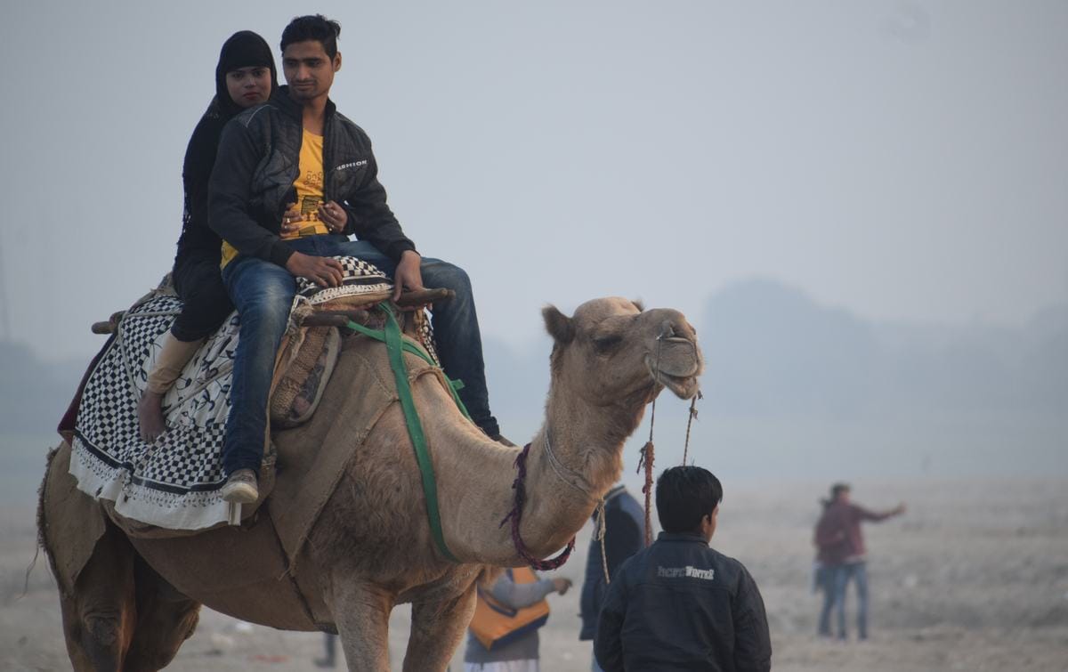 Winter season start people enjoy on across ganga in varanasi