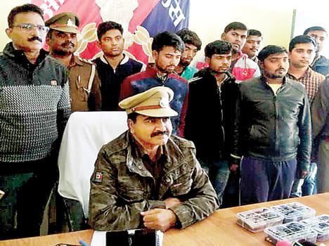 Four arrested for cheating online