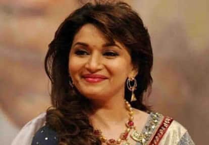 Trying to create fake voter identity card by taking photos of actress Madhuri Dixit