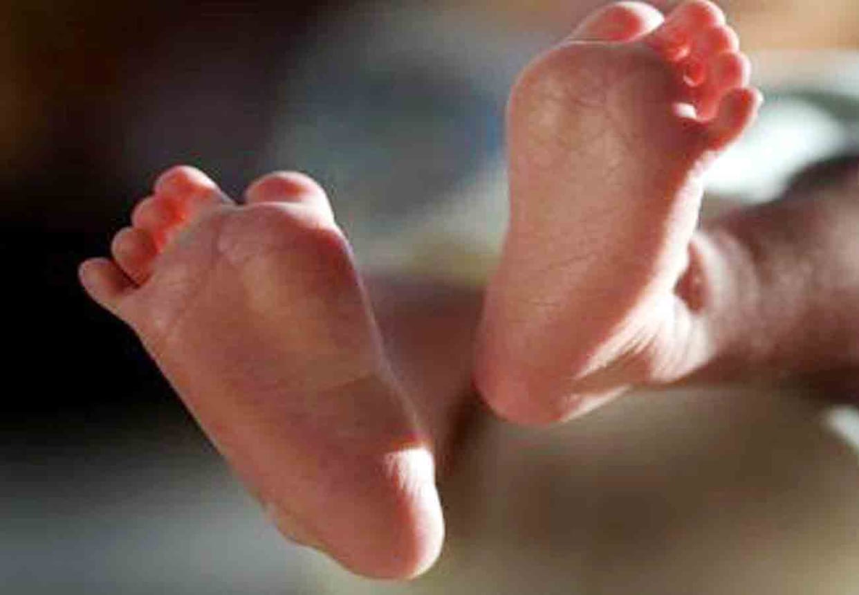 Newborn dead body found in a pile of litter