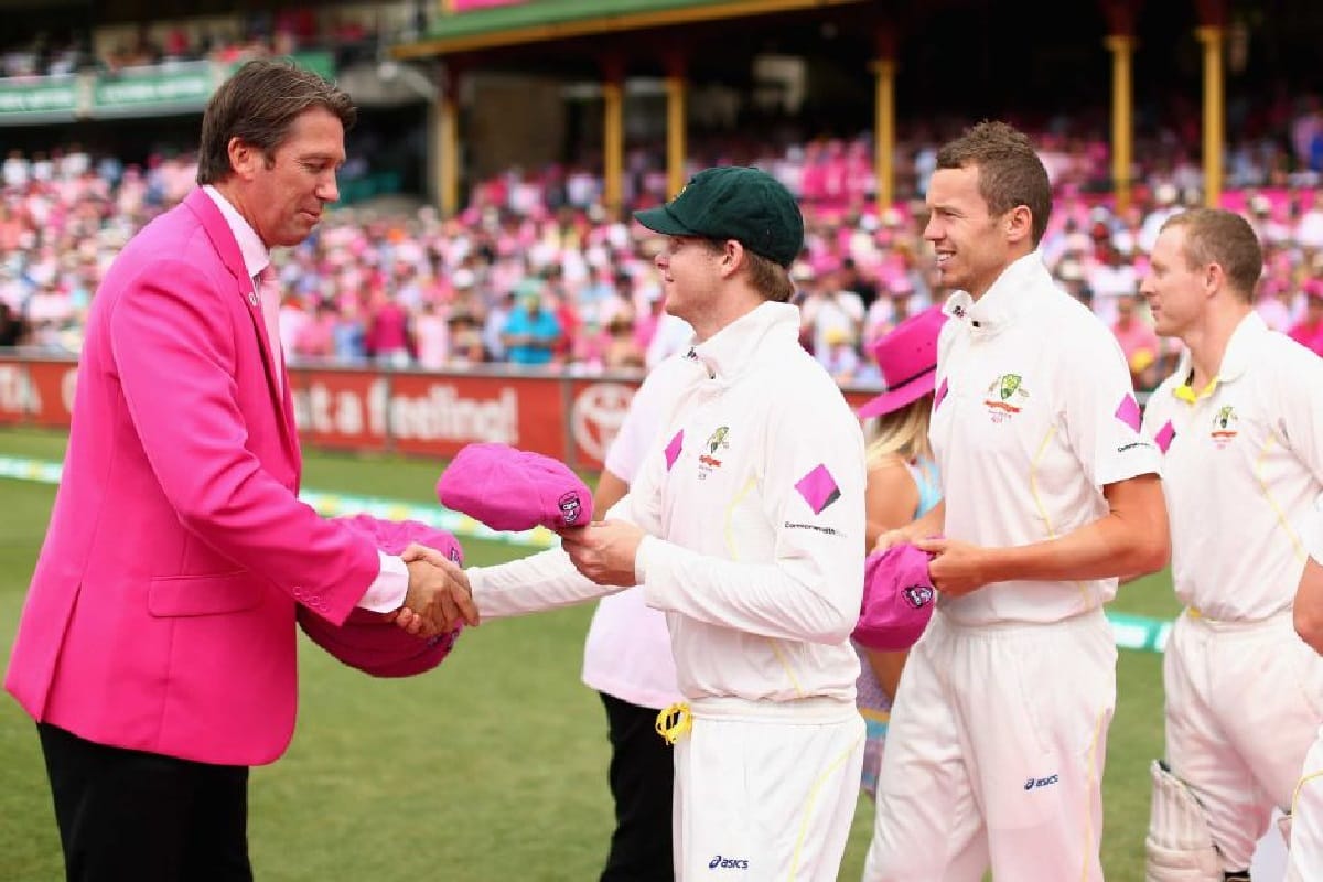 team india present pink signatured caps to glenn mcgrath during sydney test