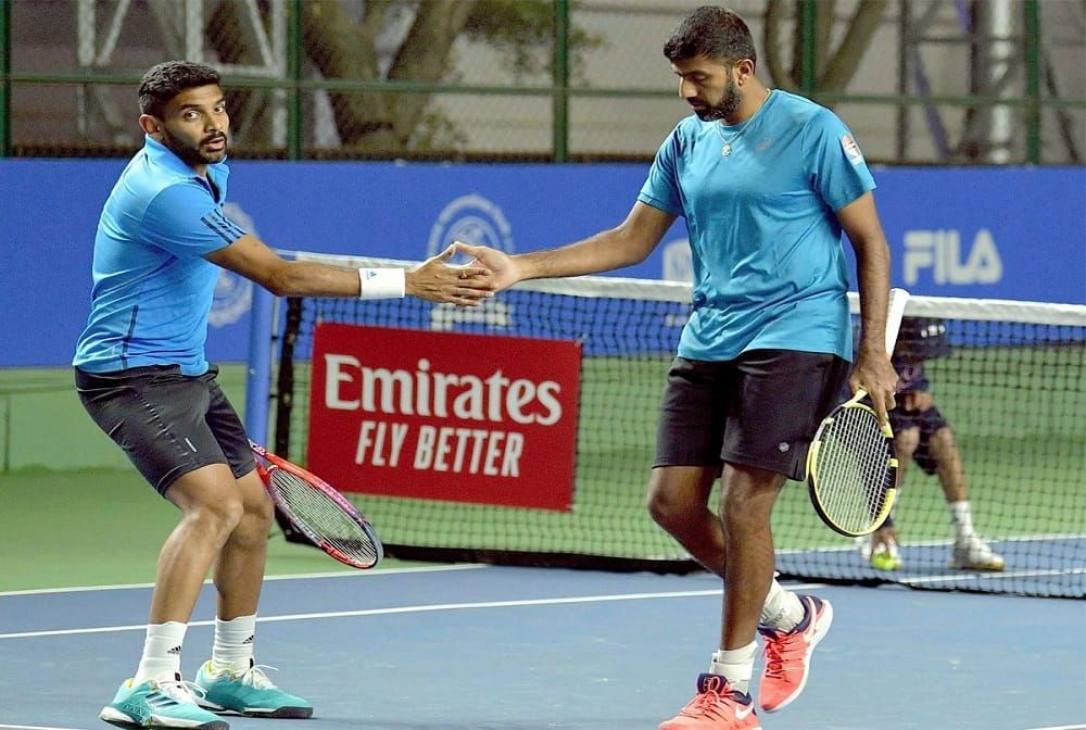 rohan bopanna and divij sharan pull off cliffhanger to enter semis