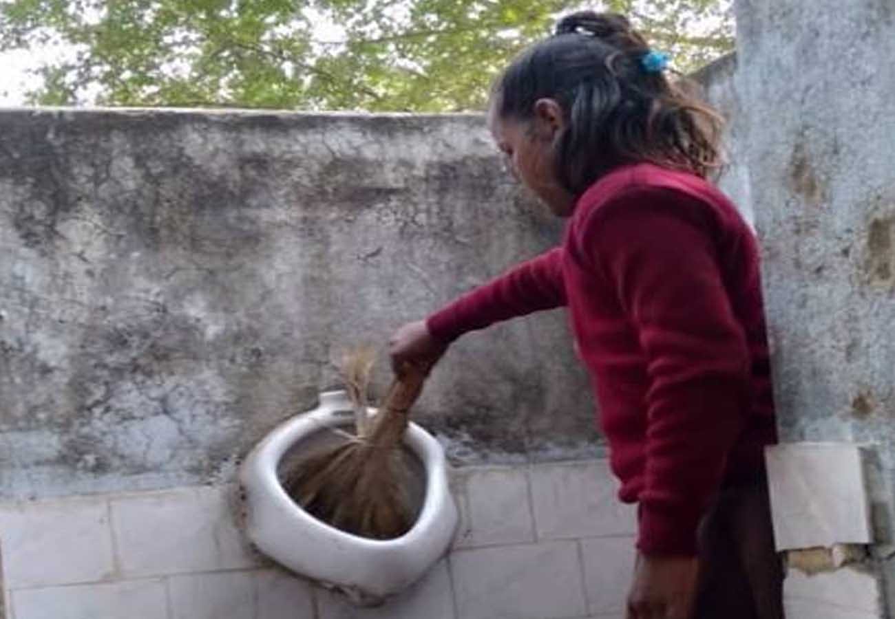 teacher forced students to clean toilets