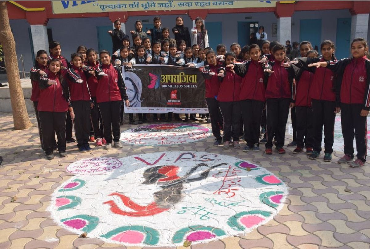 girls participated rangoli competition organised by aparajita 100 million smiles in vrindavan