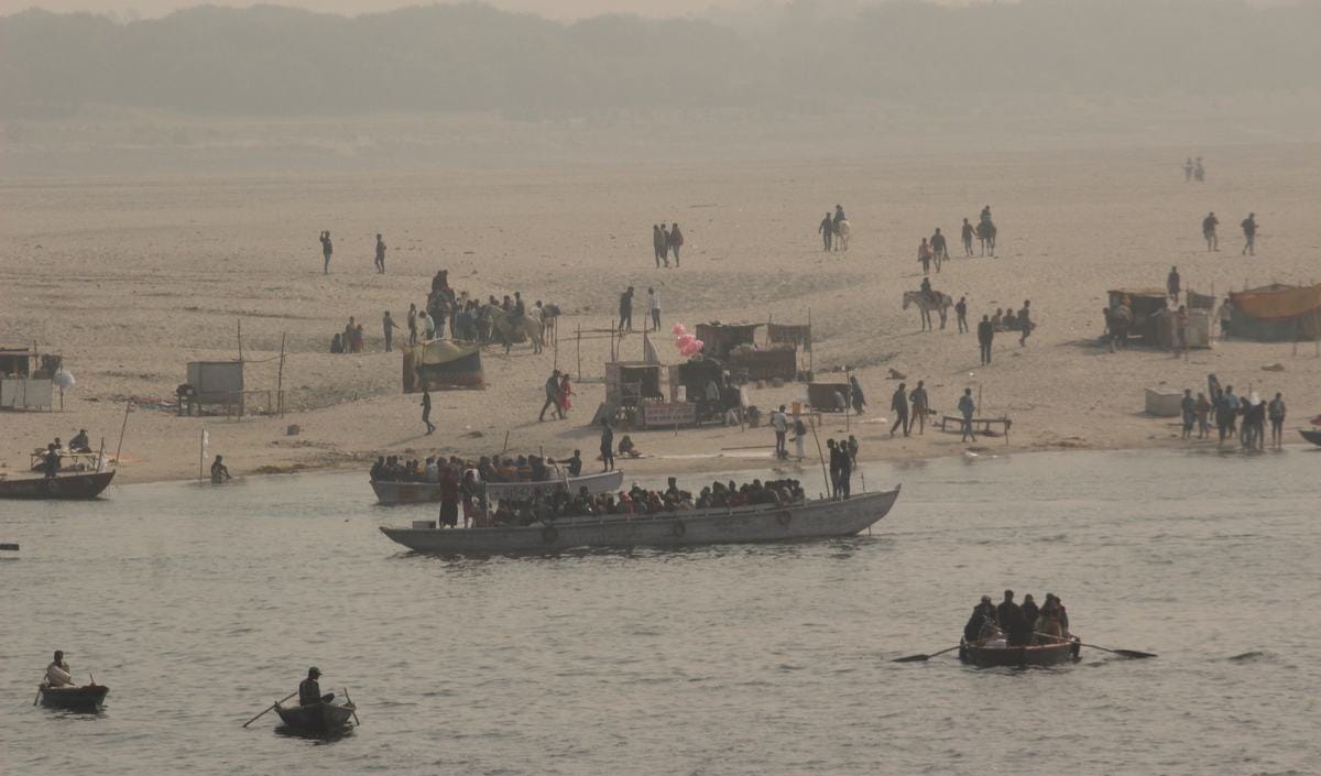 Varanasi people enjoying on ghat and across ganga