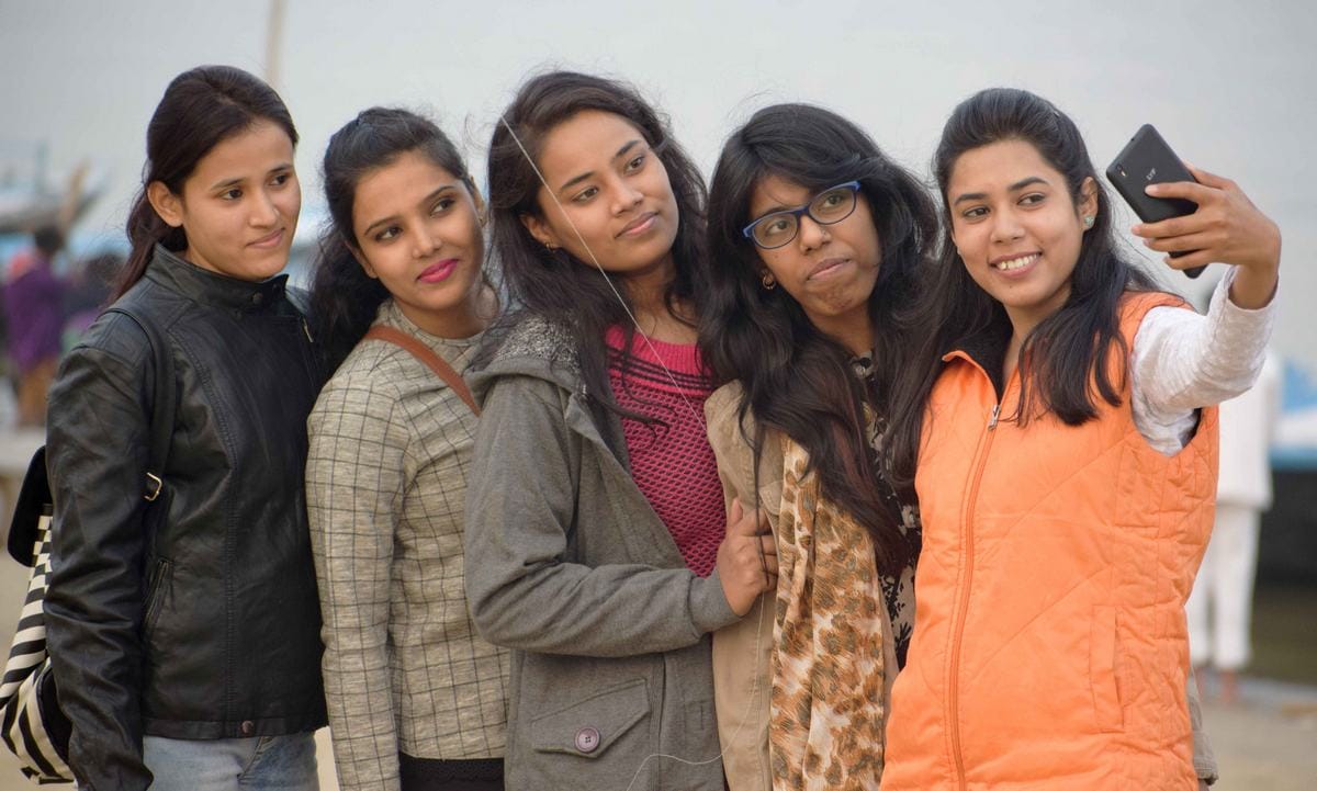Varanasi people enjoying on ghat and across ganga