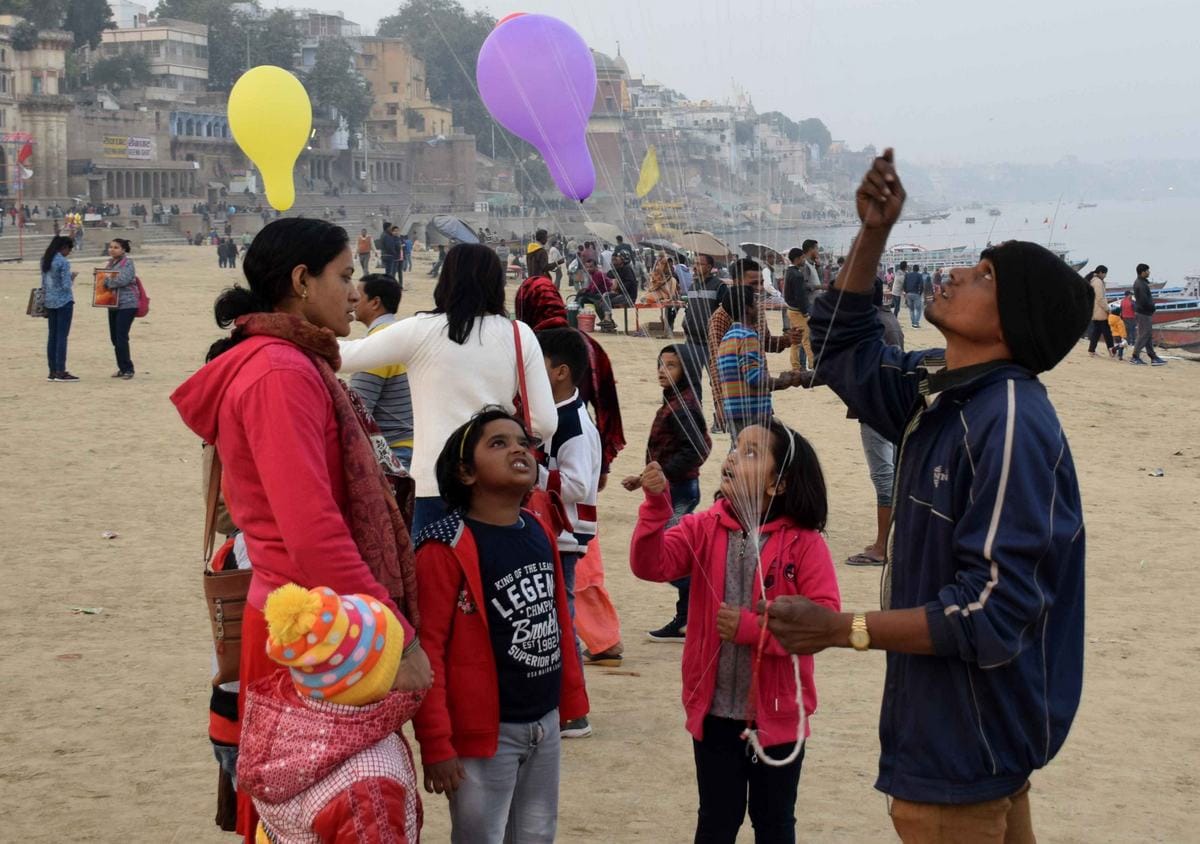 Varanasi people enjoying on ghat and across ganga