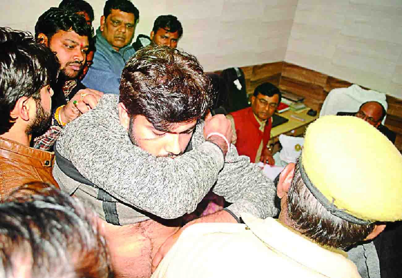 police beat BJP District President's son