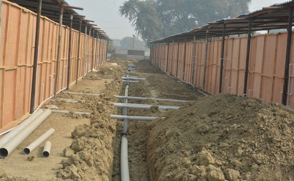 Varanasi municipal corporation and water corporation negligence for NRI summit work