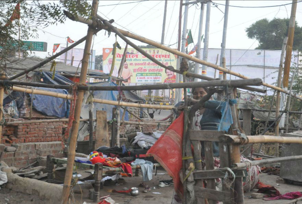 huts of poor families covered with curtains near Narendra Modi's rally venue in agra