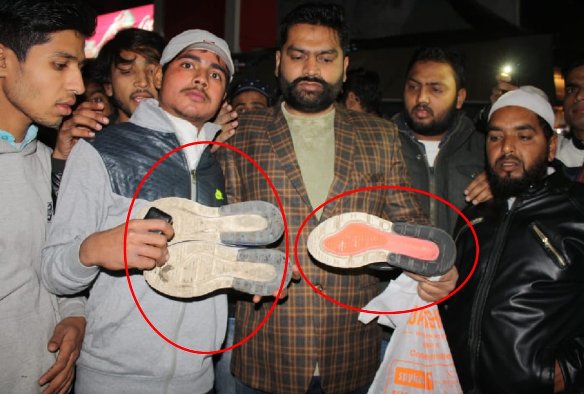 UP:  writing religious words on shoes people demanding action against the company