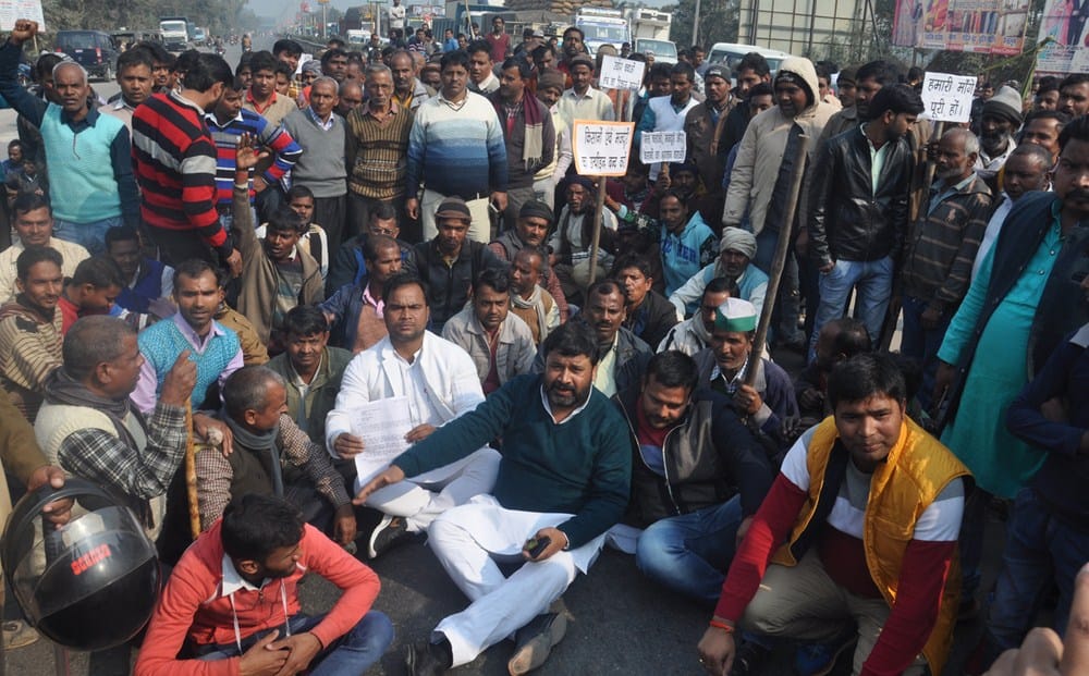 for sugar mill farmers protested on road