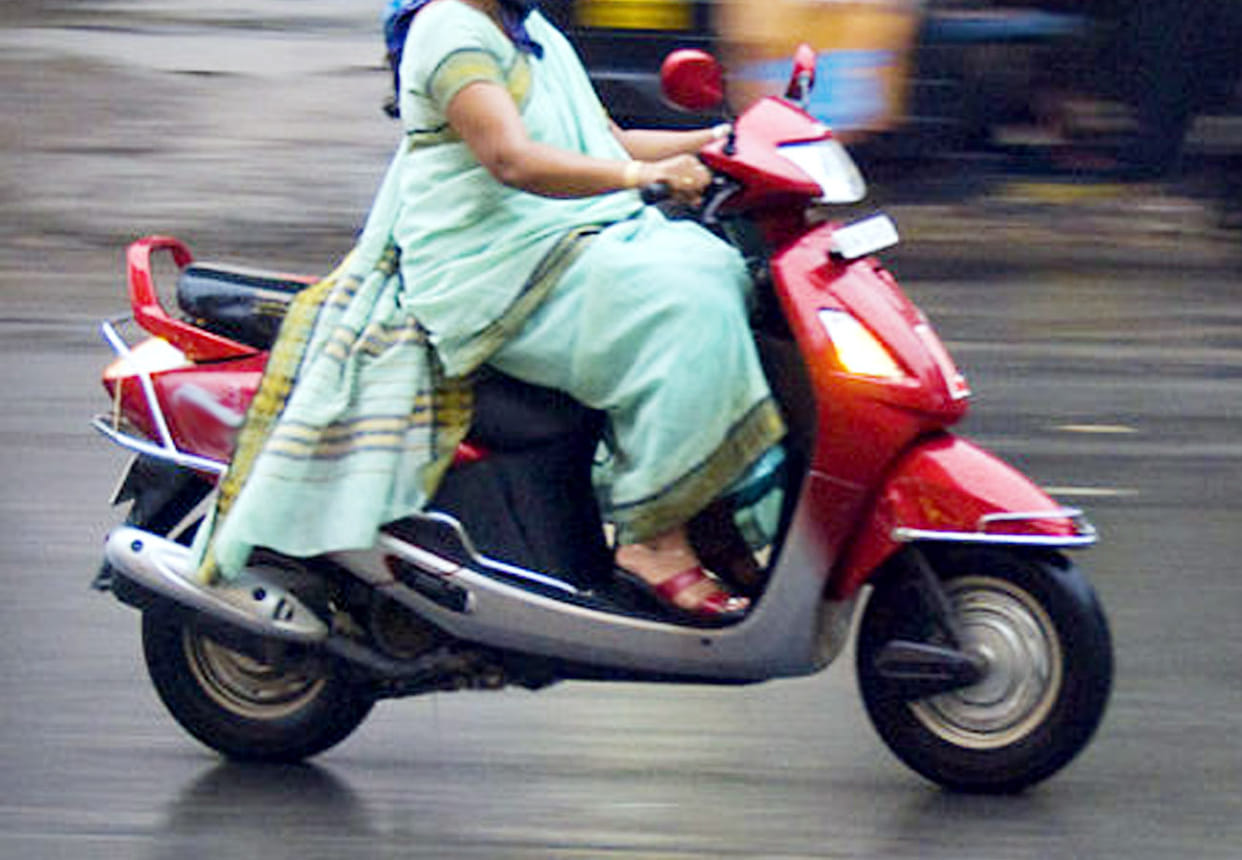 woman runs her scooty after mischievous boys