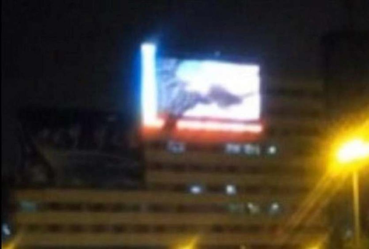 worker plays obscene film on hoarding in china